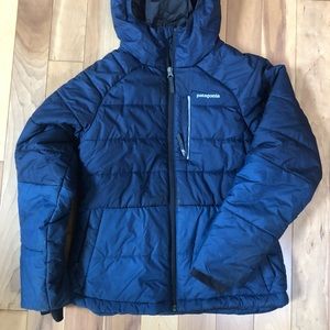 Patagonia jacket kids size XL, navy/blue two-tone puffer with hood.